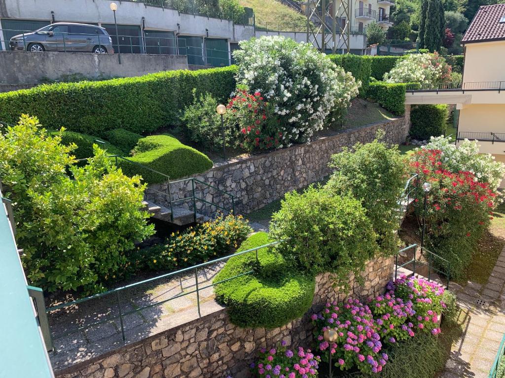 Landscaped garden and paths beside the property entrance